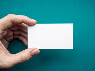 White business card Mock up in men's hand