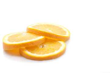 Three slices of fresh yellow juicy lemons