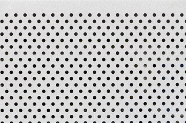 white grille and hole