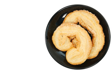 Double butterfly crispy bread on black plate with copy space