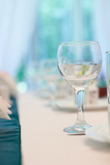 Closeup image of empty stemware standing on a table