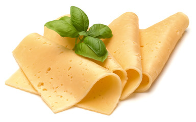 cheese slices and basil herb leaves isolated on white background