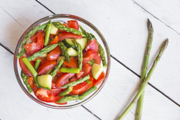 Vegetable salad with asparagus and tomatoes