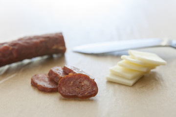 Stack of cheese and sliced jerky.