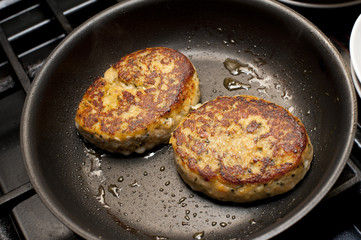 crab-cakes in pan
