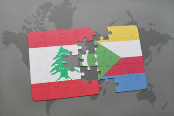 puzzle with the national flag of lebanon and comoros on a world map background.