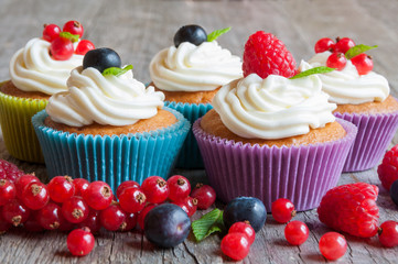 Colorful cupcakes with fresh berries