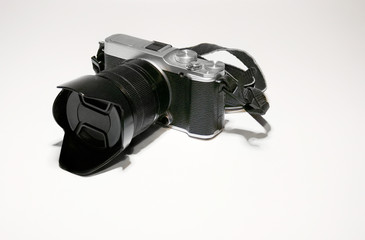 Vintage photo camera black and silver color on white background