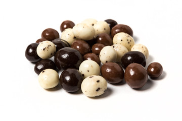 Mixed chocolate covered expresso beans isolated on white background
