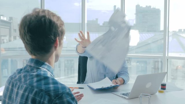 Mad, angry Boss humiliate employee, throws paper into his face. HD.
