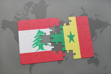 puzzle with the national flag of lebanon and senegal on a world map background.