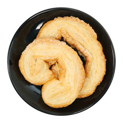 Double butterfly crispy bread on black plate