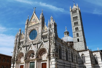 Fototapeta na wymiar Santa Maria Assunta Cathedral at Piazza del Duomo in Siena, Tuscany Italy