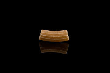 Close-up of pasta over black background