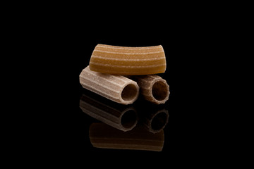 Close-up of pasta over black background