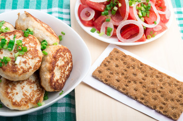 Top view of a dining table with homemade rissole