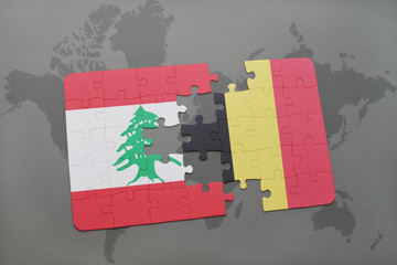 puzzle with the national flag of lebanon and belgium on a world map background.