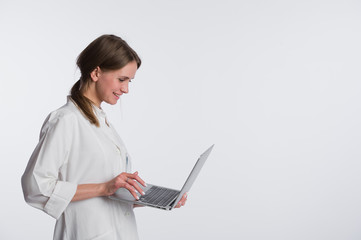 medical doctor woman smile hold tablet pc, using computer. nurse Isolated over white background