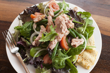 Salad nicoise topped with tuna