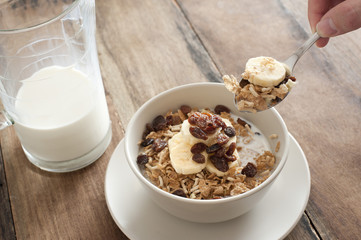 eating fruity granola cereal