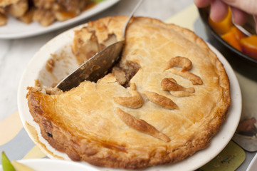 serving a pie with a spoon