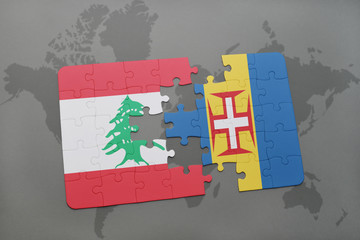 puzzle with the national flag of lebanon and madeira on a world map background.