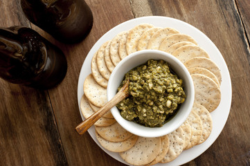 Beer and dip with crackers