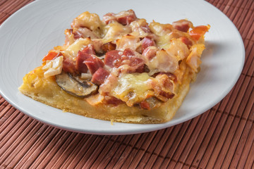 piece of pizza in a plate