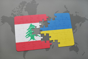puzzle with the national flag of lebanon and ukraine on a world map background.