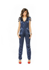 Fashion model standing in blue overall