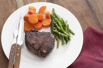 seared beef steak and vegetables