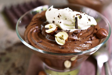 Chocolate huzelnut pudding with whipped cream.