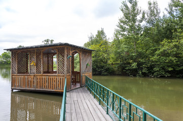 The bridge leading to the gazebo on the lake 