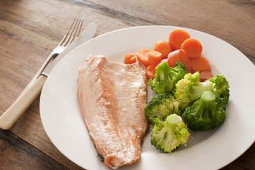 rainbow trout with carrots and broccoli