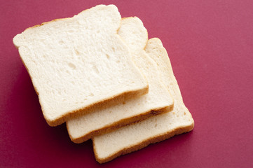 Three slices of fresh white bread