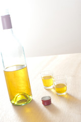 Bottle of sprits with two shots