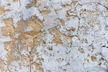 Cracks vintage old ancient cement wall, background texture