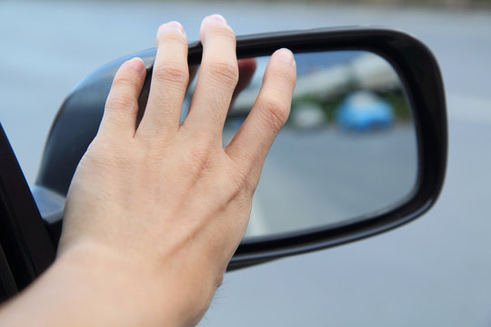 adjust  wing mirror by hand