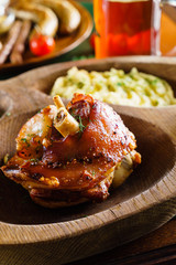 eisbein with braised cabbage, salad and beer