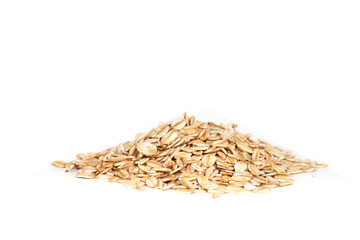 Oats flakes pile on white background