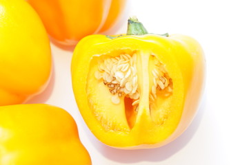 Naklejka na ściany i meble Yellow pepper isolated on a colorful background. Vegetables isolated on background.