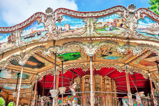 Entertainment Carousel for the youngest children. Horses on a ca