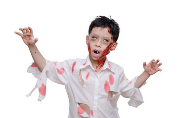 Young asian boy in zombie make up and costume over white