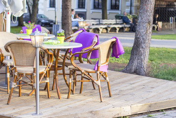 background cityscape table at an outdoor cafe