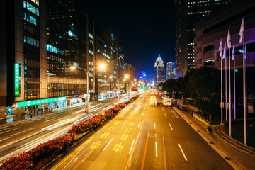 Modern buildings and street at night, in the Xinyi District, Tai