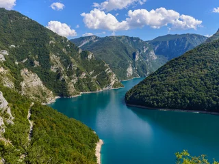 Fototapete Schlucht A Beautiful view Piva canyon in sunny day with clouds.