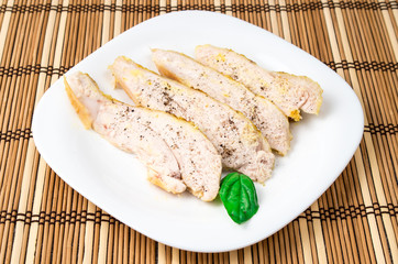 Baked chicken sprinkled with spices