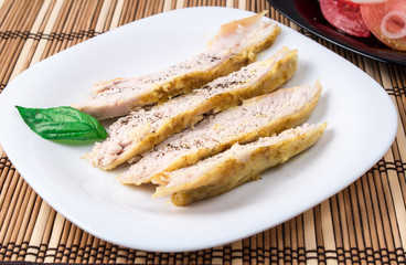 Fillets cut into pieces of baked chicken
