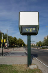 high temperature on the street. A thermometer with no advertisement showing 48 degrees