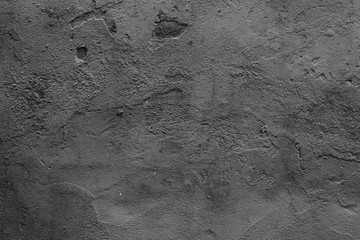 Wall fragment with scratches and cracks